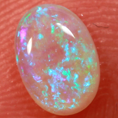SOLID CRYSTAL OPAL Bright green fire in a 3 dimensional pattern